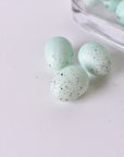 1.25" Faux Light Blue/Green Eggs With Speckles (24 eggs)
