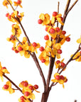 Faux bittersweet branch with hard plastic berries and poly silk blooms