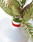 11" Faux Hemloch Stems w/Pinecones in Container with Red Velvet Bow