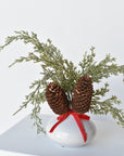 11" Faux Iced + Glittered Cypress Stems w/Pinecones in Container with Red Velvet Bow