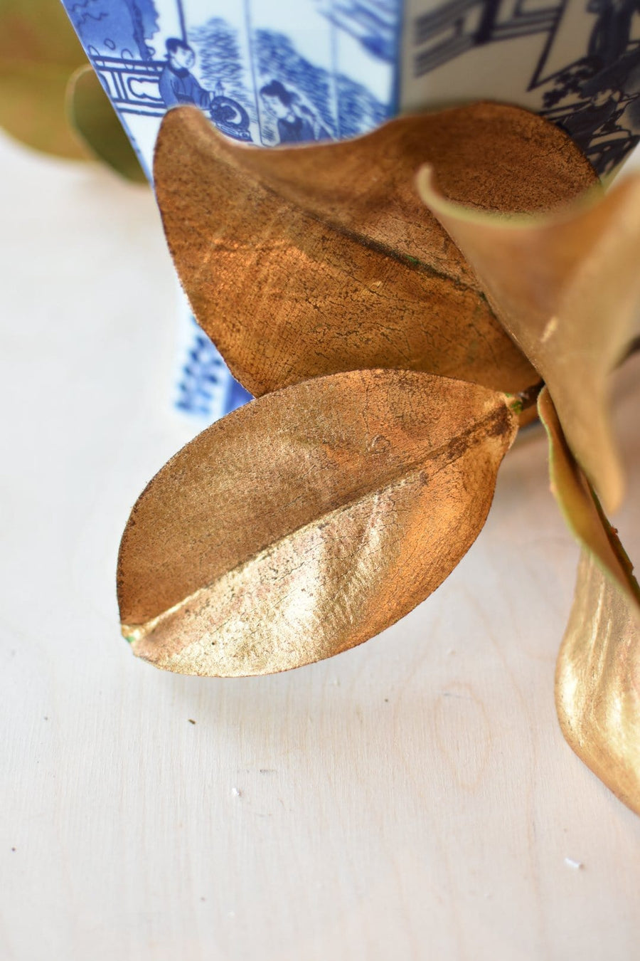 11" Faux Gold Metallic Magnolia Leaf Stem