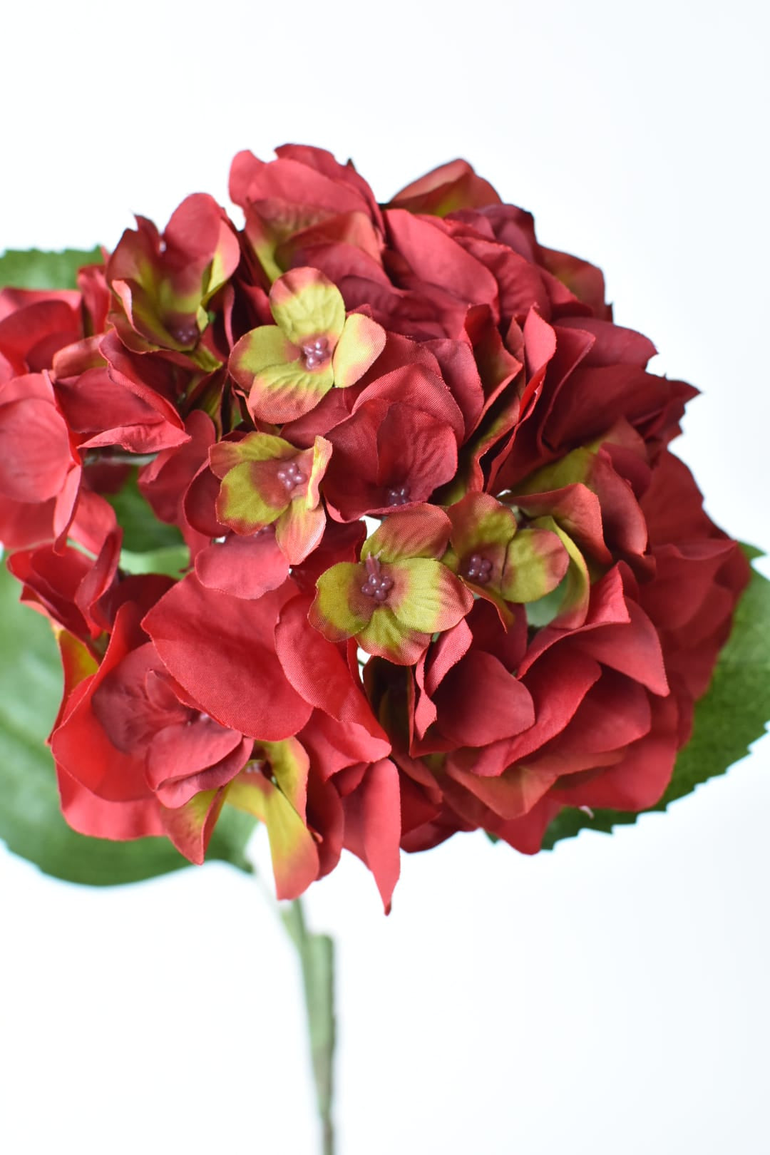 Close-up of a 7-inch red faux hydrangea head showing individual florets