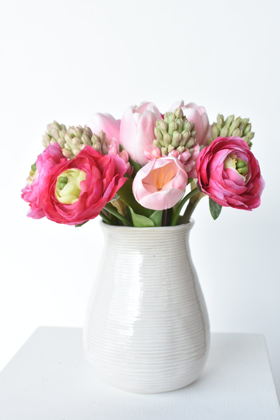 11" Shades of Pink Ranunculus, Hyacinth, and Tulip Bundle