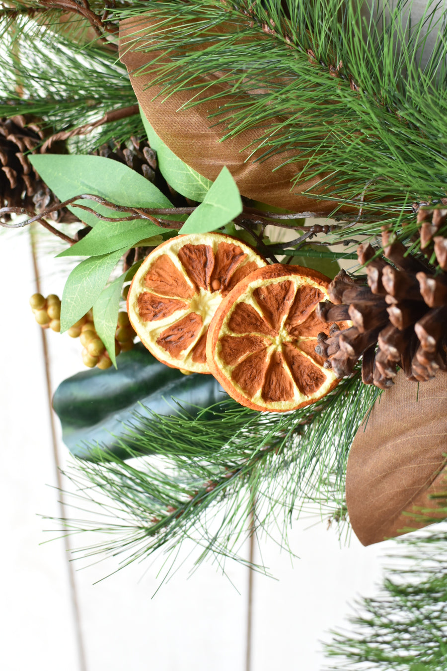 24" Faux Mixed Pine, Magnolia, Orange, and Berry Wreath