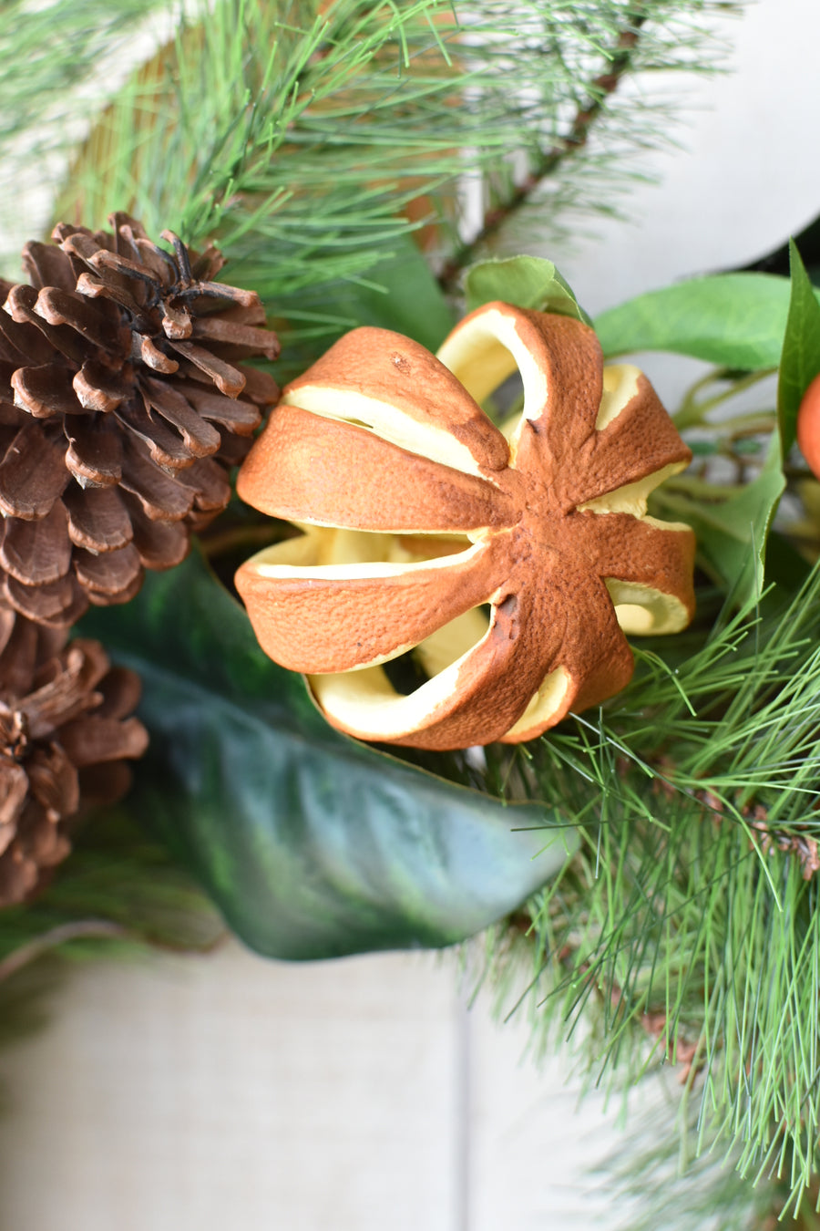 24" Faux Mixed Pine, Magnolia, Orange, and Berry Wreath