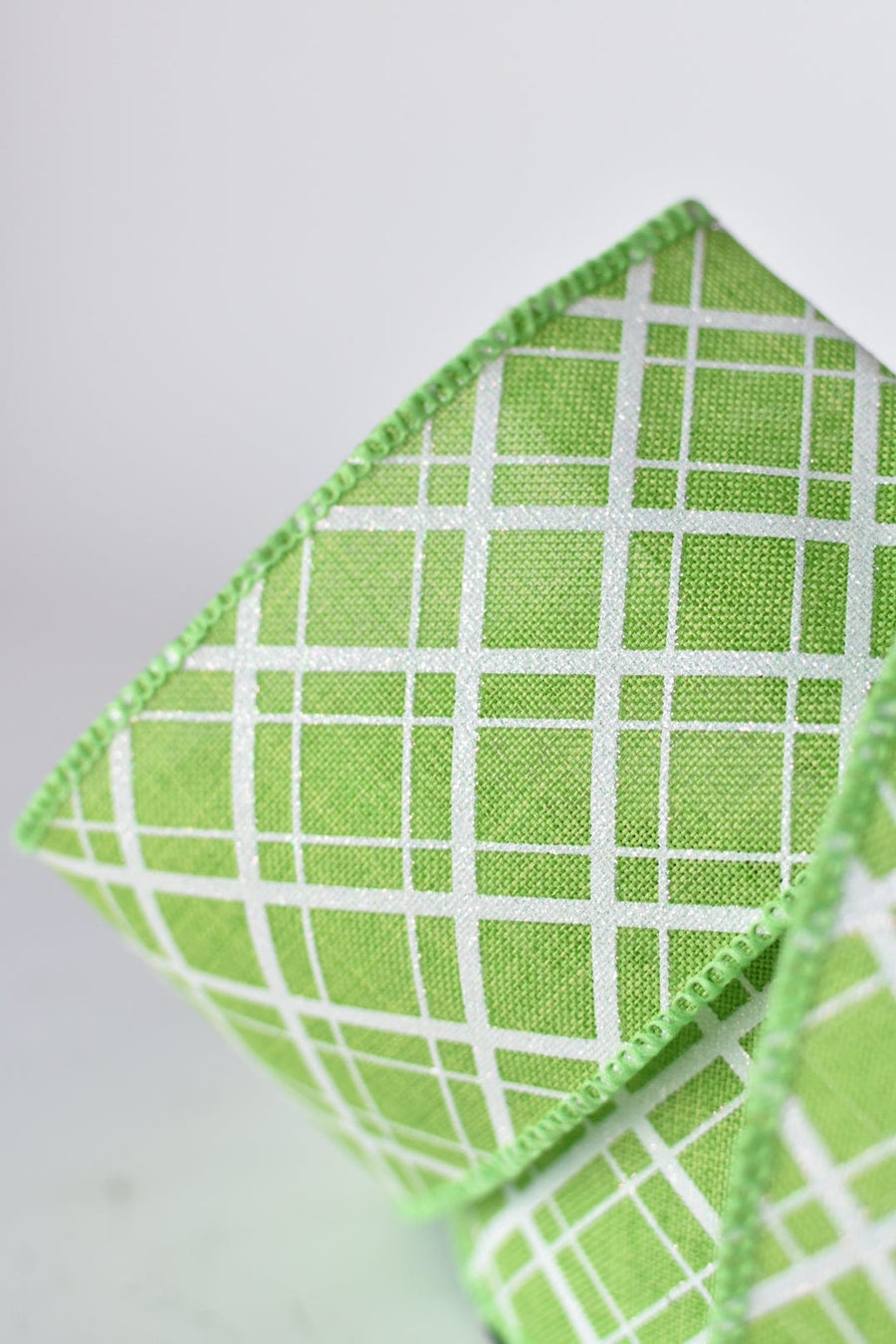 2.5" x 10yd Green and White Glittered Plaid Wired Ribbon