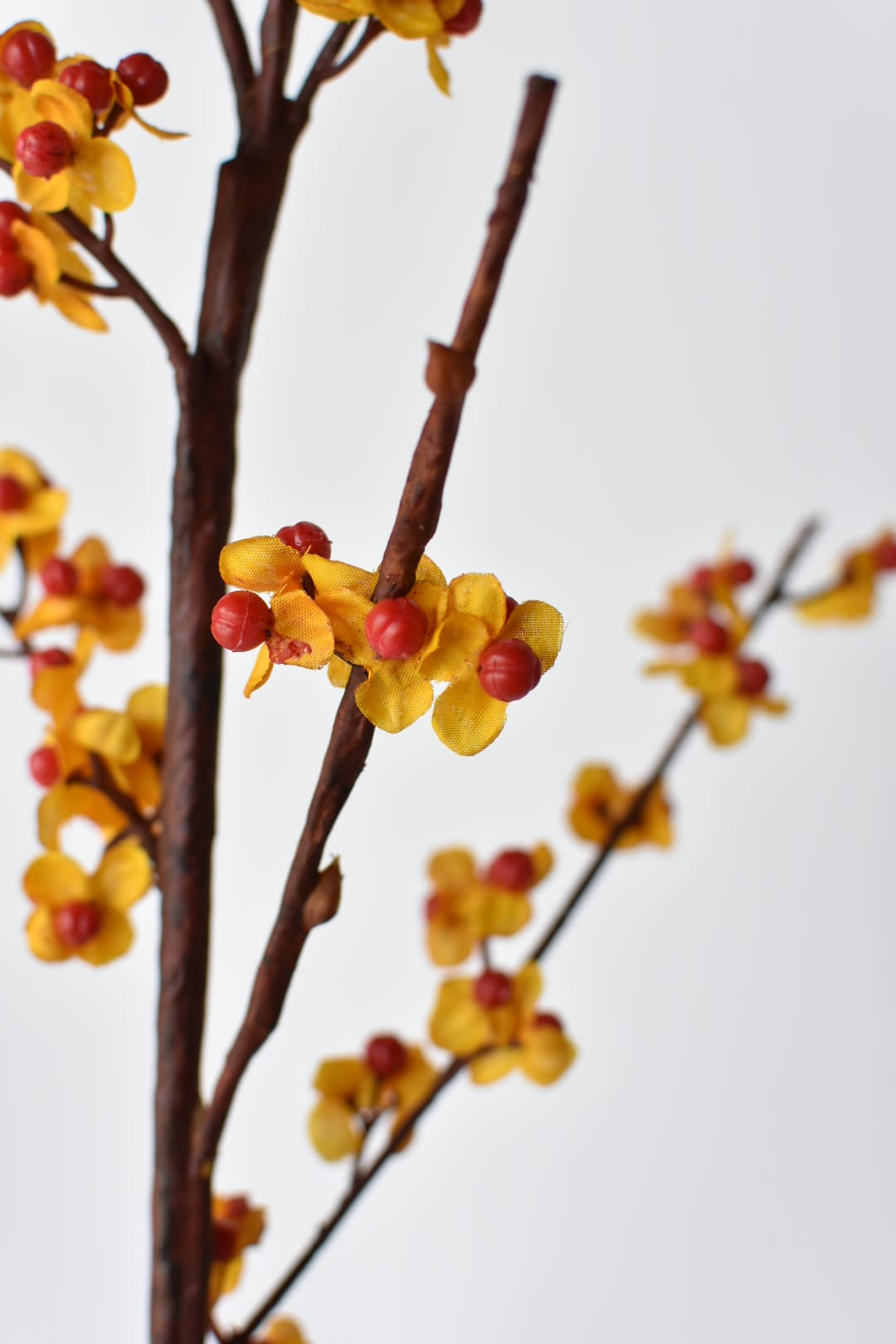 Artificial bittersweet vine stem for fall wreaths and door sprays