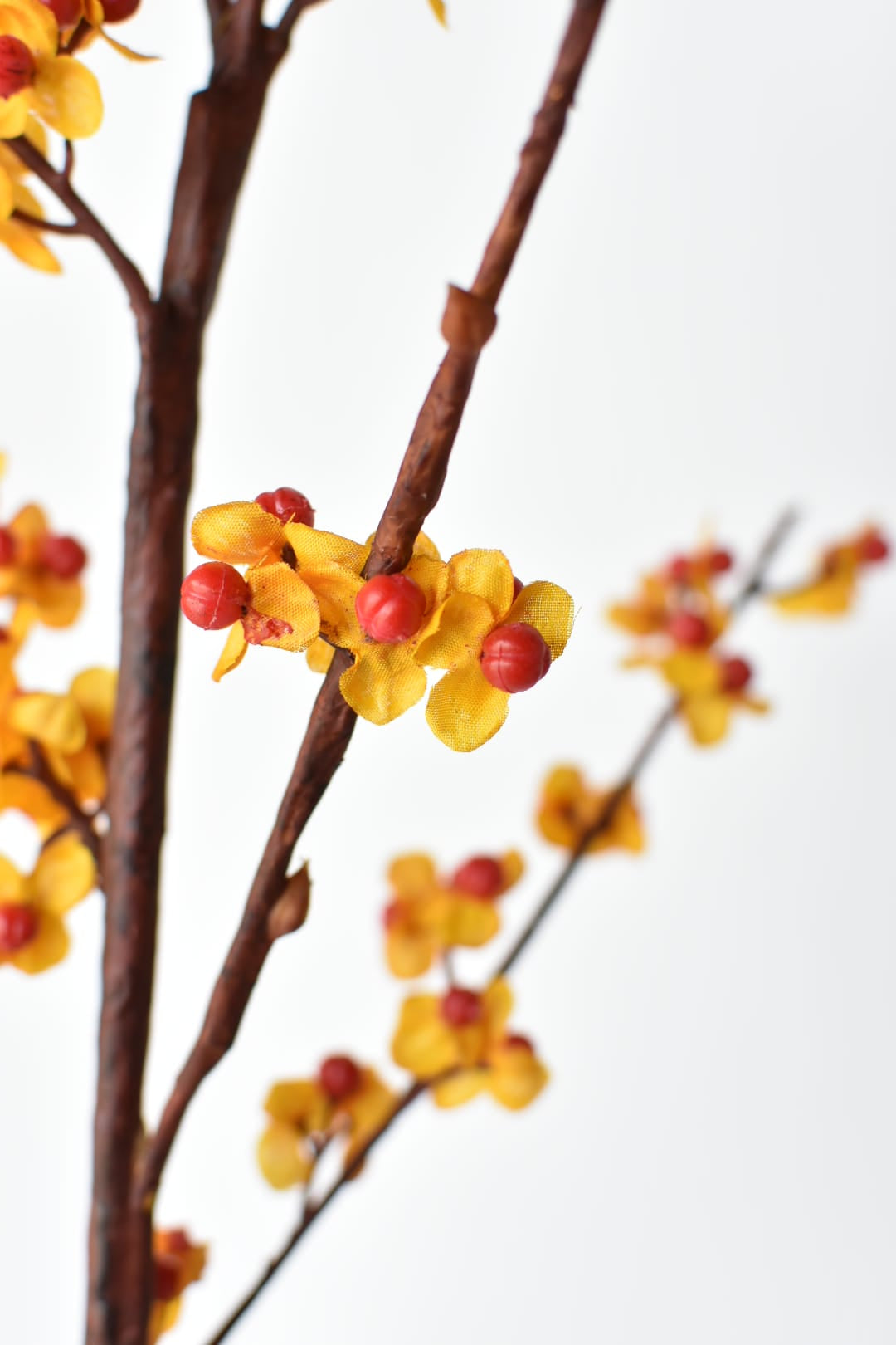 40 inch faux bittersweet berry stem with orange berries