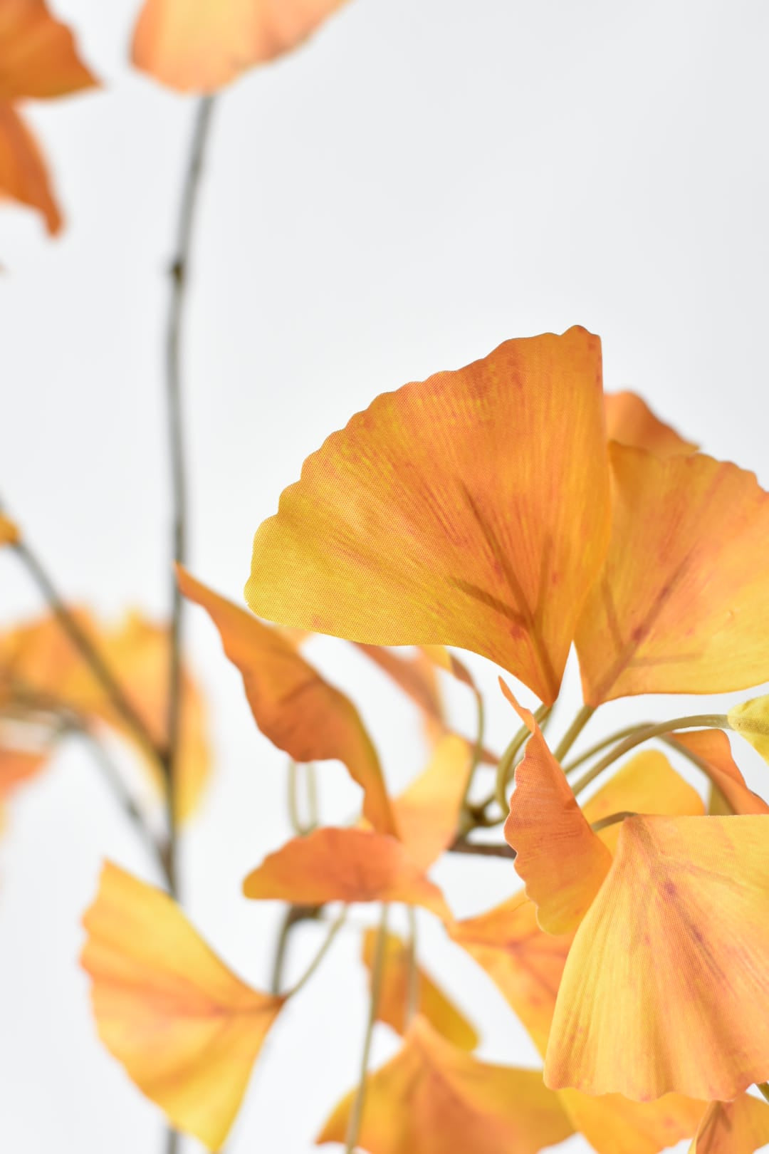 Faux yellow ginkgo leaf stem with 70 plus leaves for a tall urn