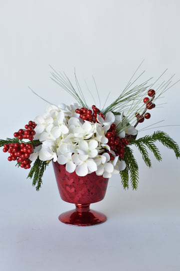 White Hydrangea + Greens in Red Glass Container