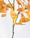 Tall faux fall foliage stem that splits at 21.5 inches from the base