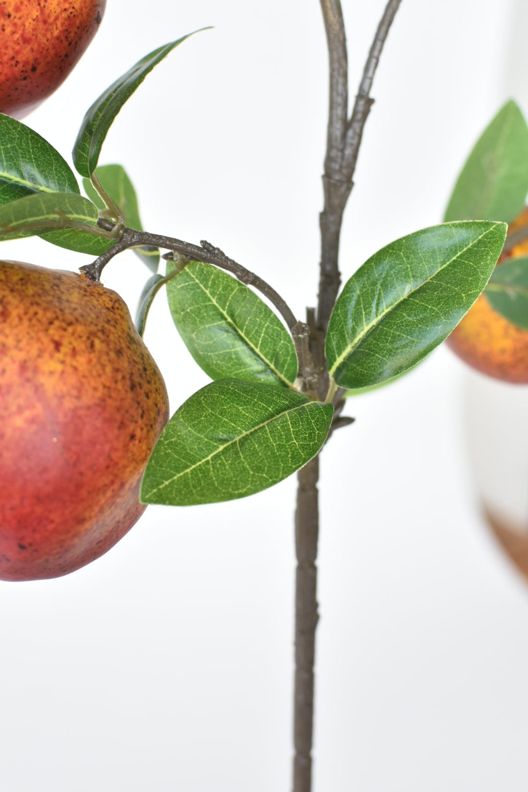 Wired artificial pomegranate branch that cuts apart into pieces for wreaths and garlands