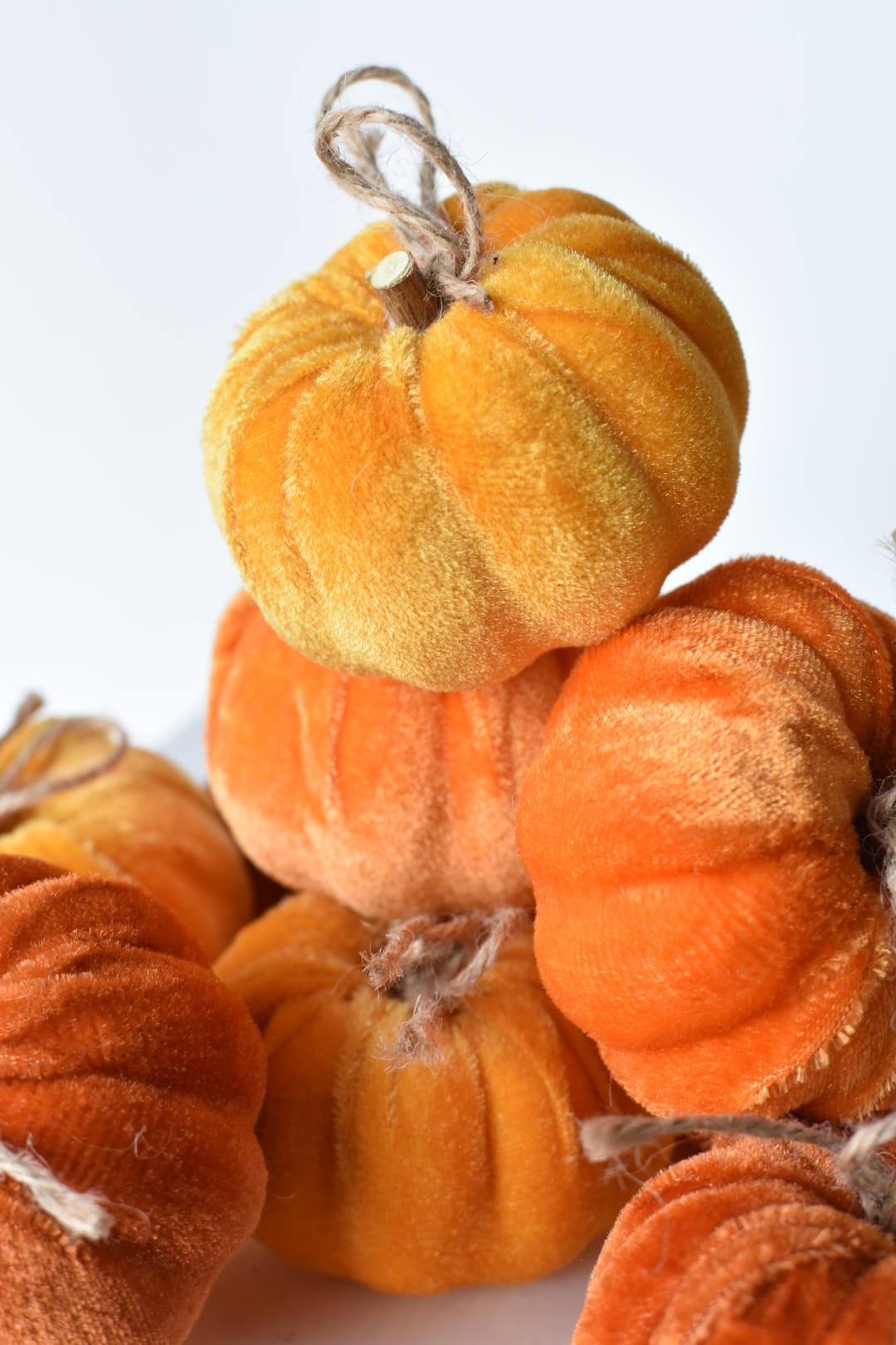 Goldenrod and orange velvet pumpkins for a Thanksgiving table