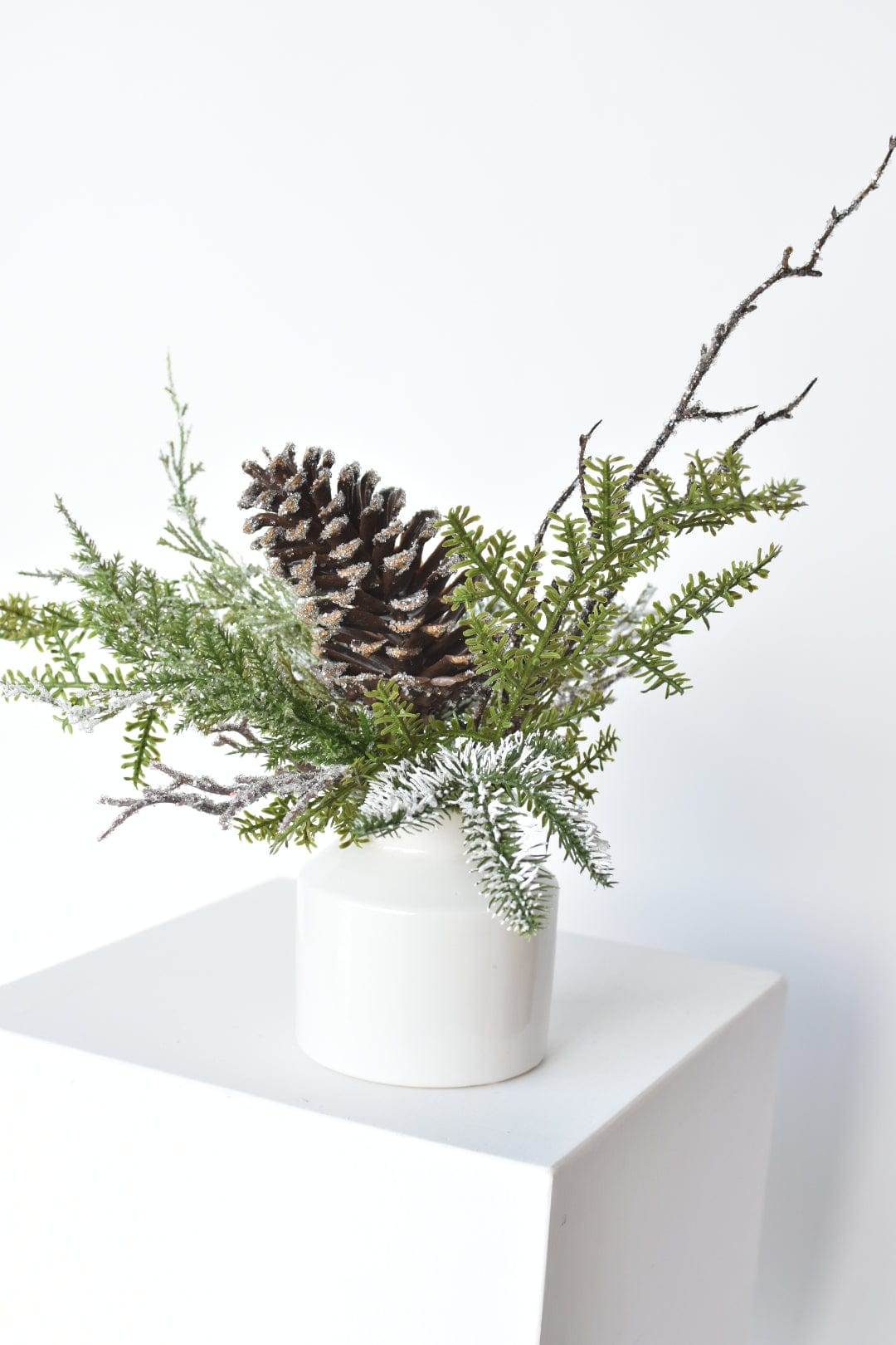 13" Iced Pinecone and Pine in White Ceramic Vase