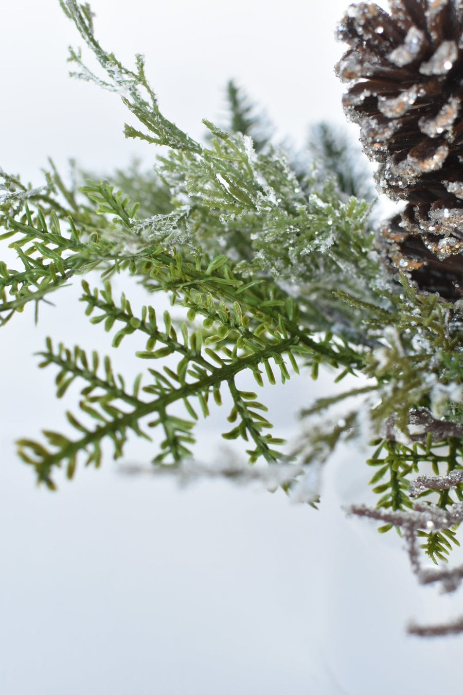 13" Iced Pinecone and Pine in White Ceramic Vase