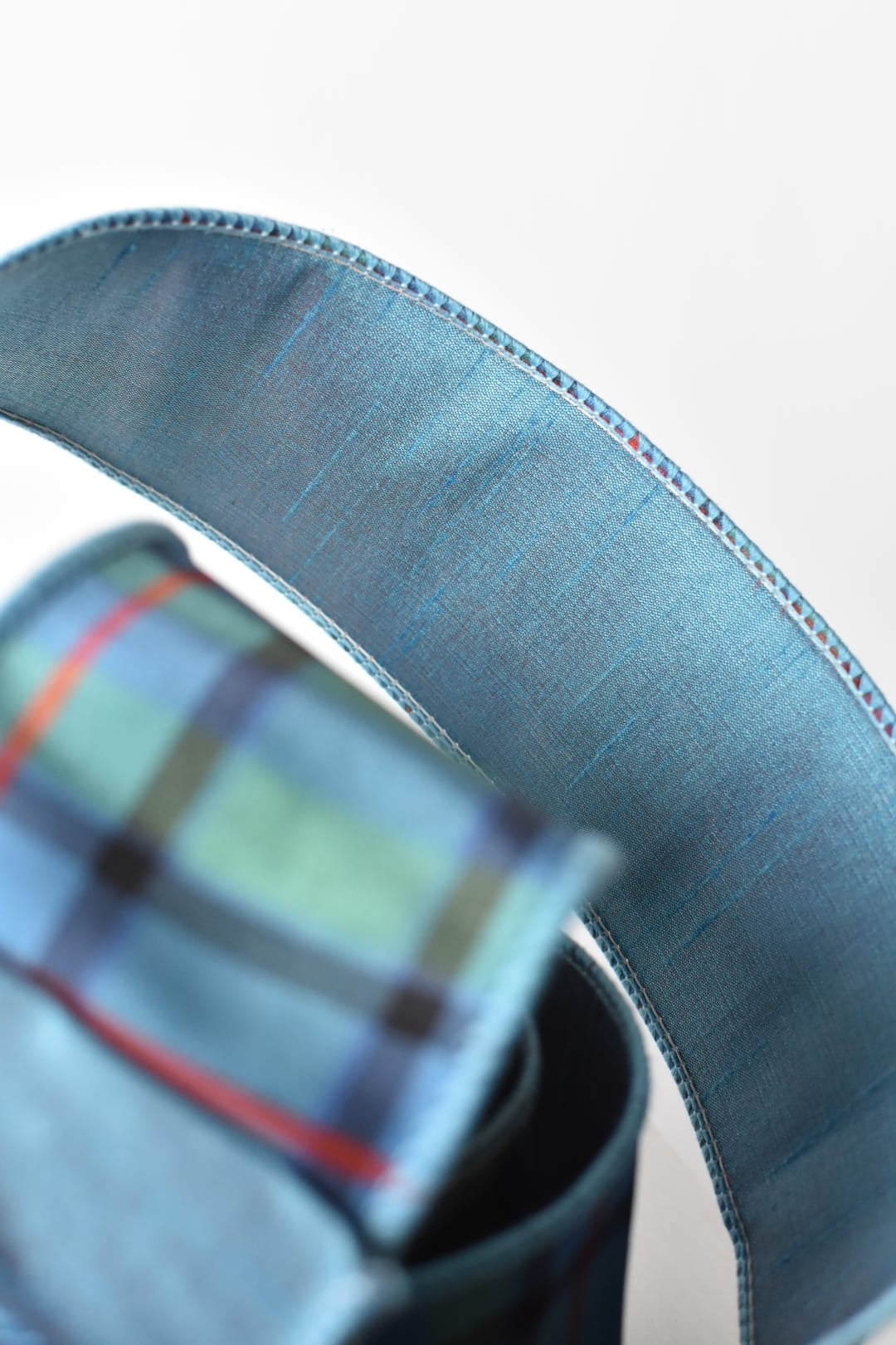 10 yard roll of 2.5 inch light blue plaid wired ribbon for bows
