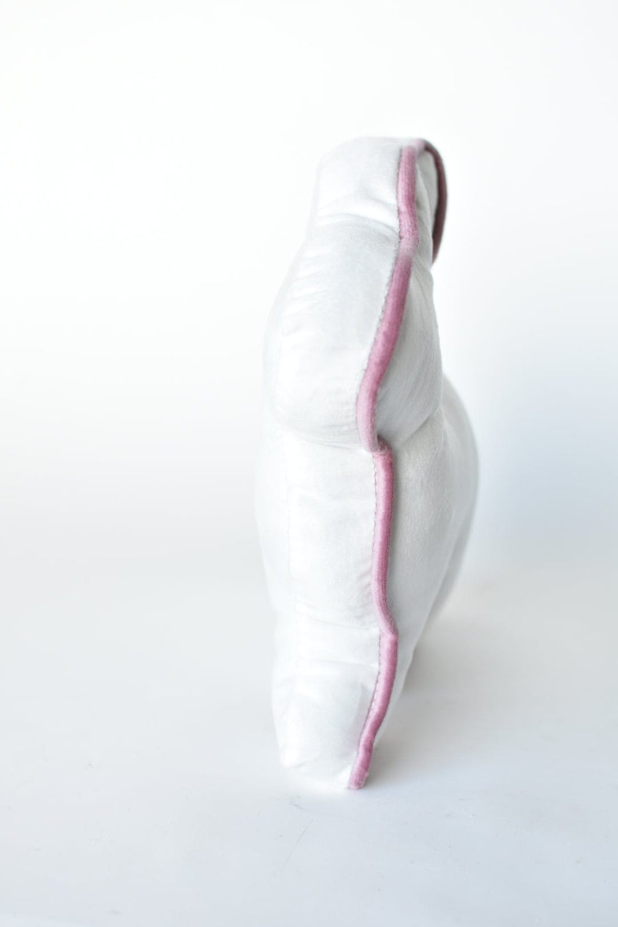 10.5" White Bunny Pillow w/Contrast Pink Welt - Side Facing