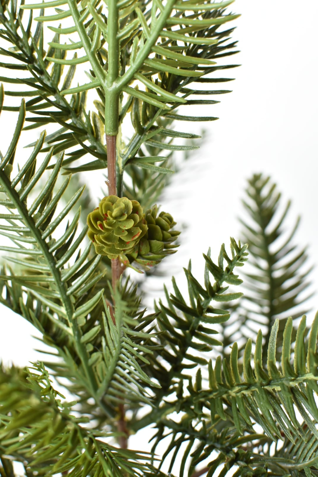 17 inch faux pine bush with five branches and small pine cones