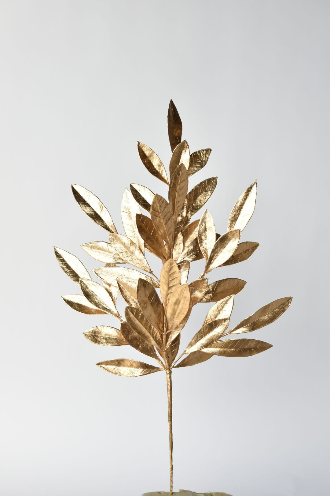 24 inch faux gold bay leaf stem with fifty metallic gold leaves on wired branches
