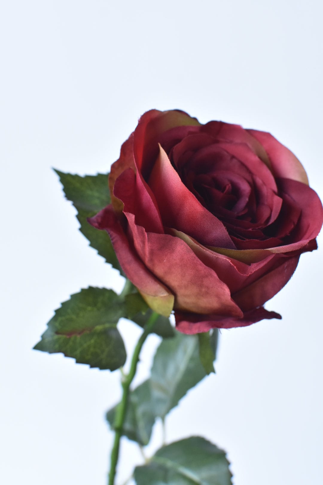 22" Faux Tea Stained Burgundy Rose Bud Spray Stem