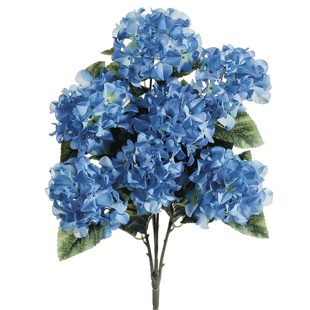 faux silk blue hydrangea bush with green leaves and green stem on a white background