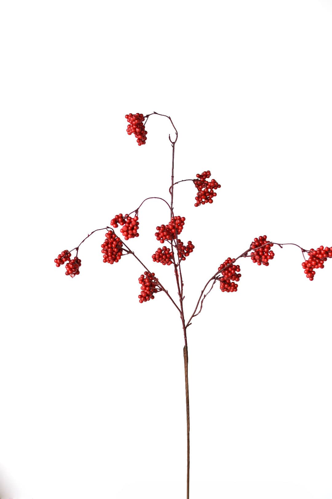 Red faux berries in detail showing the protective coating over the foam